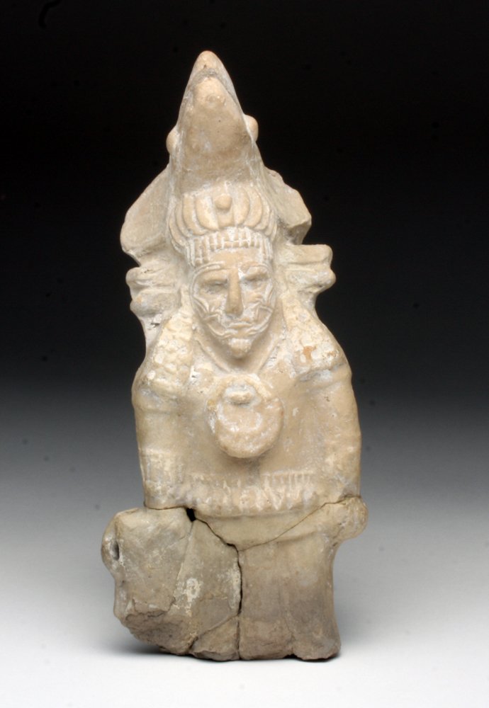 Fine Mayan Jaina Island Figural Whistle: Campeche Coast, Mexico, Jaina Island, ca 500 to 800 CE. Very well executed pottery whistle in the form of a very stern warrior. He wears an animal skin headdress, long ear sashes, scarified face with 