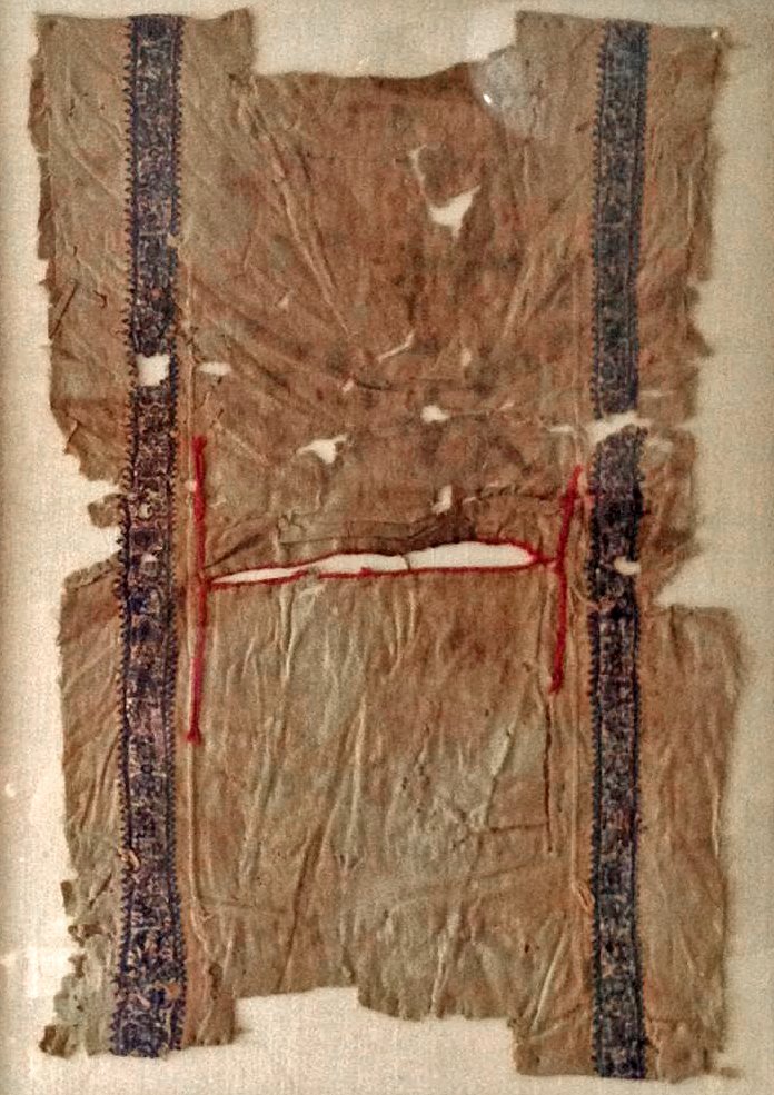 Ancient Egyptian Coptic Textile Tunic: Egypt, ca. 4th - 5th century CE. This rare Coptic textile tunic was cut down in size for a child to wear in ancient times and is a most interesting and rare example of a full Coptic textile garment. T
