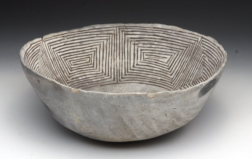 Anasazi Gallup Black on White Polychrome Bowl: Native American, North America, east central Arizona and west central New Mexico, Anasazi culture, ca. 1030-1125 CE. The linear geometric designs adorning the inner walls of this bowl are so finely pa