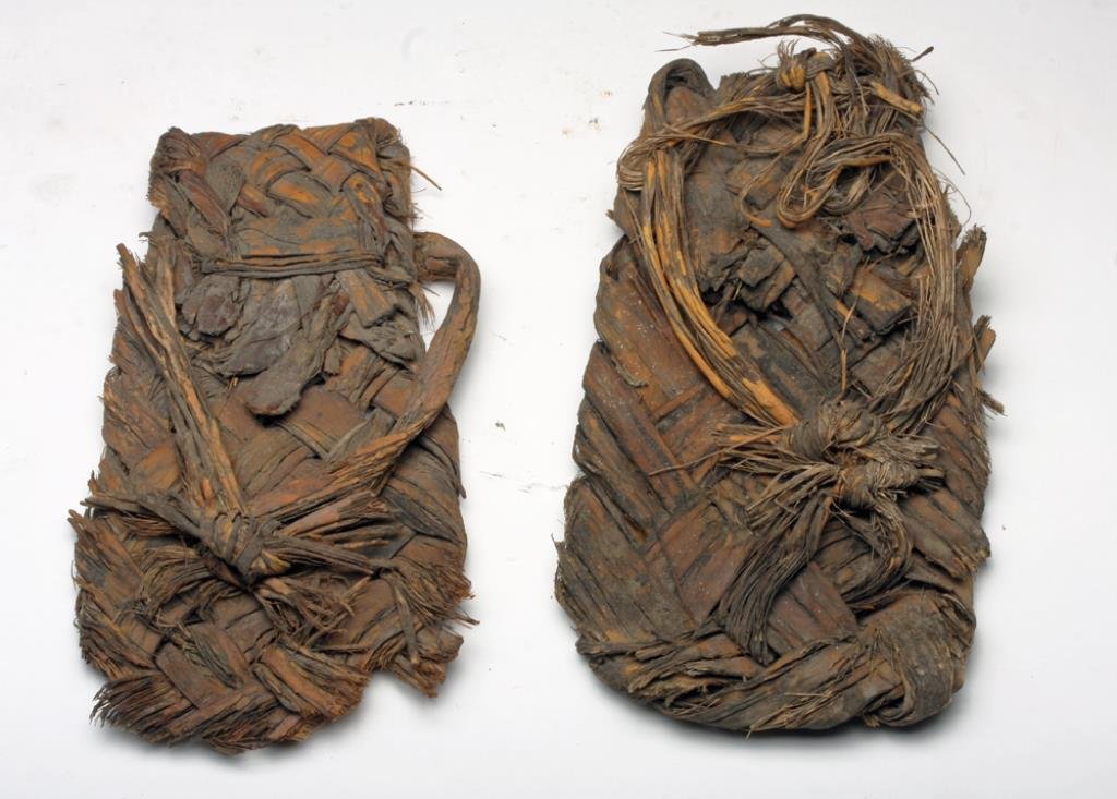 Prehistoric Anasazi Hand-Woven Sandals: Native American, North America, New Mexico, ca. 1-500 CE. Hand woven sandals made from leaves of the desert yucca plant. Yucca leaves were used either whole, split or separated. Sometimes they were sh