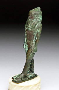 Egyptian Bronze Striding Amun: Egypt, Late Dynastic Period, Ca 700 to 330 BCE. Wonderful bronze sculpture of Amun, striding, on an integral plinth, hands held in formal position at his sides, wearing long false beard of power,