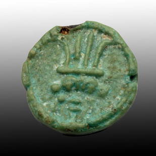 Greco-Egyptian Faience Seal, Bes & Eye of Horus: Egypt, under Greek rule, ca 330 to 250 BCE. Very rare faience round amulet/seal. On one side is impressed an Eye of Horus, the other with an image of the Egyptian god Bes - drilled for suspension