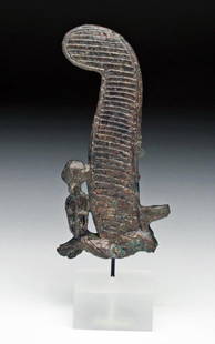 Egyptian Bronze Atef Feather: Egypt, Late Dynastic Period, Ca 700 to 330 BCE. Fine bronze casting of an Atef feather. Bulls horn and uraeus cobra wearing solar disc along base, large ostrich plume with multiple horizontal