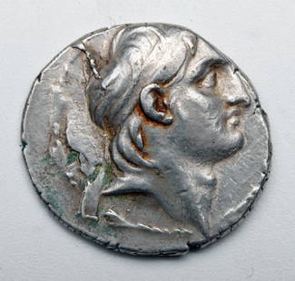 Ancient Greek Silver Tetradrachm - Demetrius I: Greek Empire, modern day Syria, Ca 162 to 150 BCE. Large silver tetradrachm with bust of Demetrius I on front, Tyche seated on reverse holding cornucopia. 30mm Diameter. 16.7 grams. 