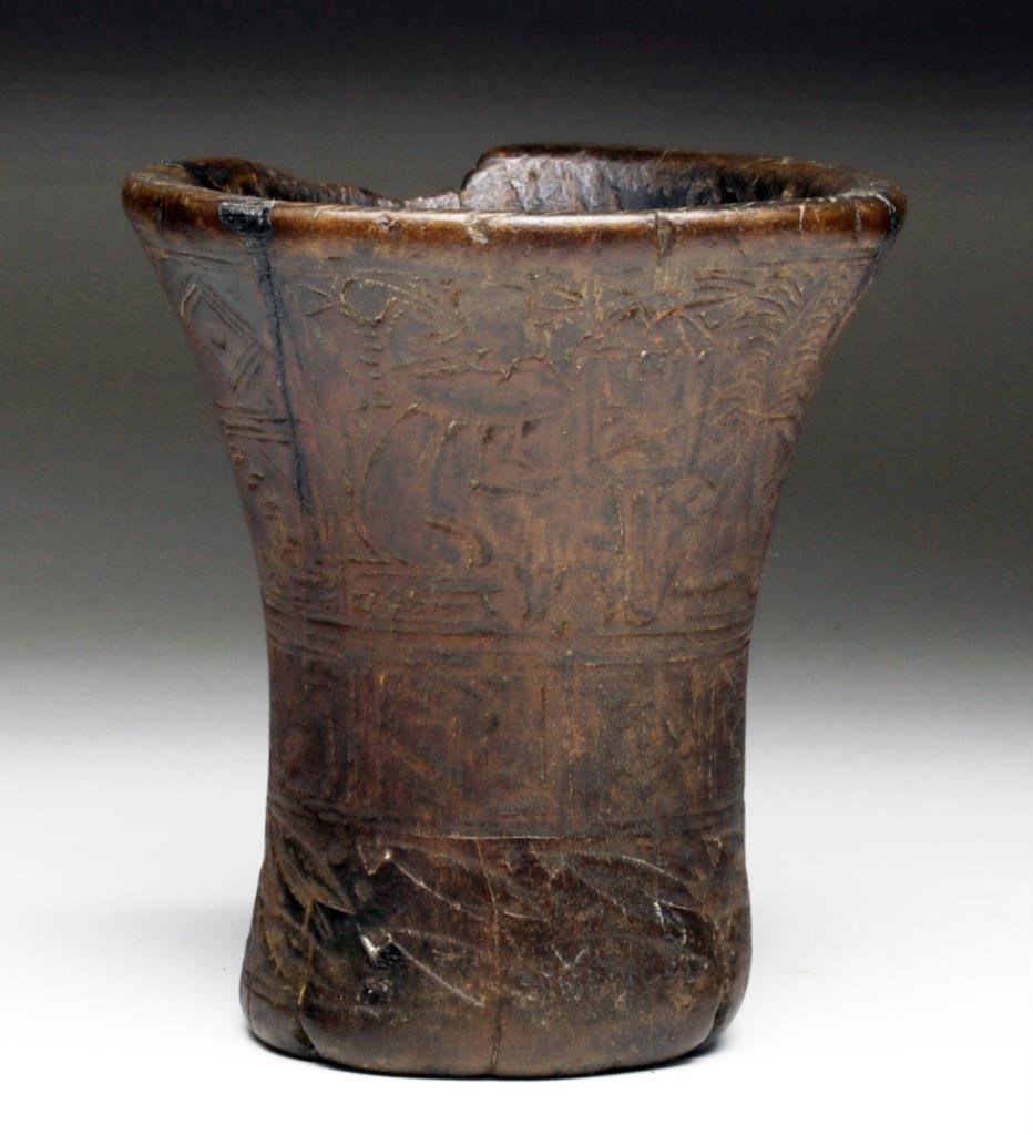 Inca Wood Kero, Incised Motifs: Pre-Columbian, Central Peru to northern Chile, Ca 1400 CE. Hand-carved wooden drinking vessel of flared cylindrical form, used for enjoying Chicha - fermented corn beer. Extensive incised decorations 