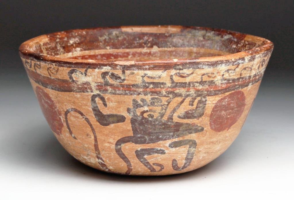 Pre-Columbian Mayan Monkey Bowl: Mayan territories, probably El Salvador or Honduras, Ca 550 to 850 CE. Unusual pottery bowl of typical form, painted with very abstract monkeys. Each monkey is in deep brown pigment, with long tail, l