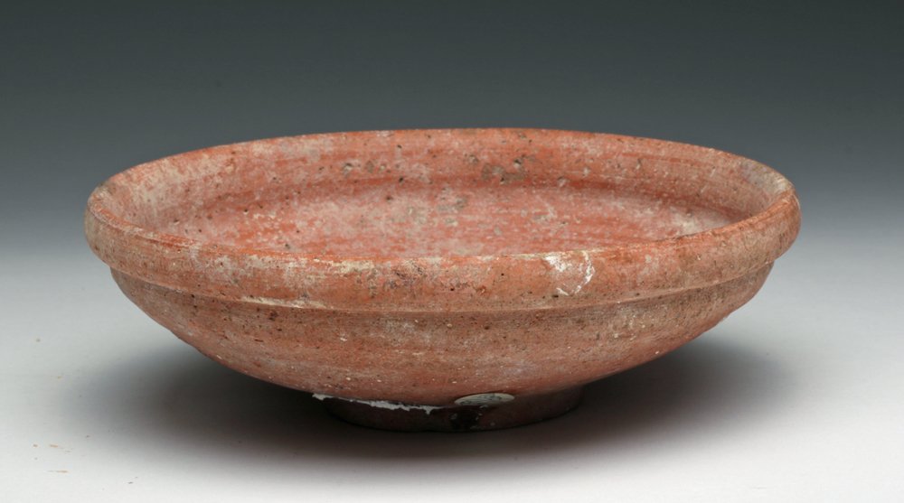 Iron-Age Pottery Bowl found in Jerusalem, ex-Barakat: Israel, found in Jerusalem, Ca 1200 to 800 BCE. Choice pottery redware bowl, turned on the wheel with raised rim and short foot. 6-1/2" D. Provenance: Ex Houston, TX collection acquired at Barakat Gal