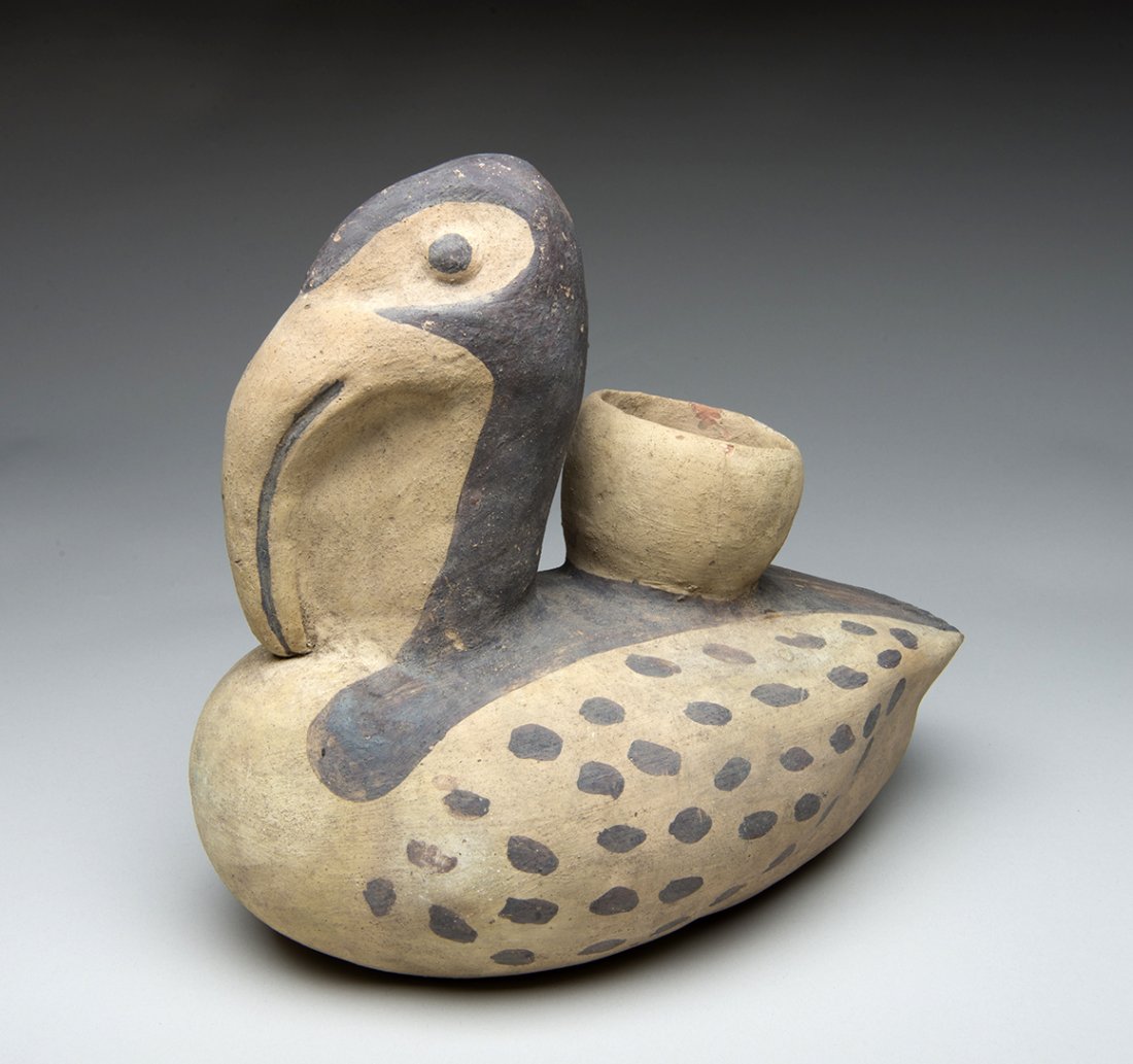 Rare Pre-Columbian Pottery Chancay Pelican: Peru, Ca 1000 to 1200 CE. Super rare! Pottery jar in the form of a resting pelican. Head folded over body with large beak and spotted body. 9" H. Provenance: Ex Westermann Collection. All items legal