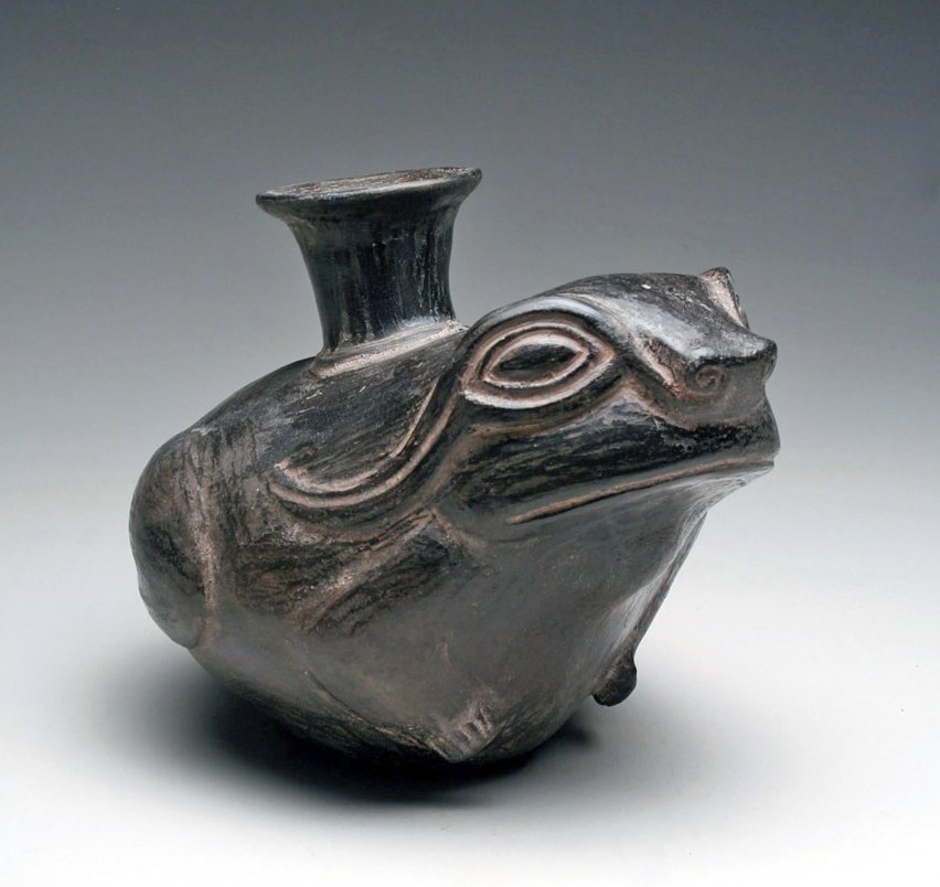 Lovely Inca Pottery Vessel of Frog: Pre-Columbian, Inca, Ca 1400 to 1500 CE. Inca pottery vessel in the form of a frog. Highly polished blackware jar with almost metallic glaze, fat frog sits with spout emerging from his back. 6" H. Pro