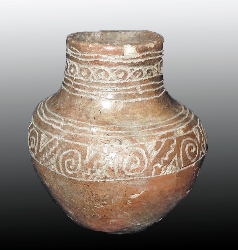 Pre-Columbian Incised-Decorated Orange Olla: Nayarit, W. Mexico, Ca 300 BCE to 300 CE. Attractive olla with sloped walls, nicely incised with repeating geometric patterns around rim and at midsection. 3 1/4" wide Provenance: Ex-Lynn Langdon coll