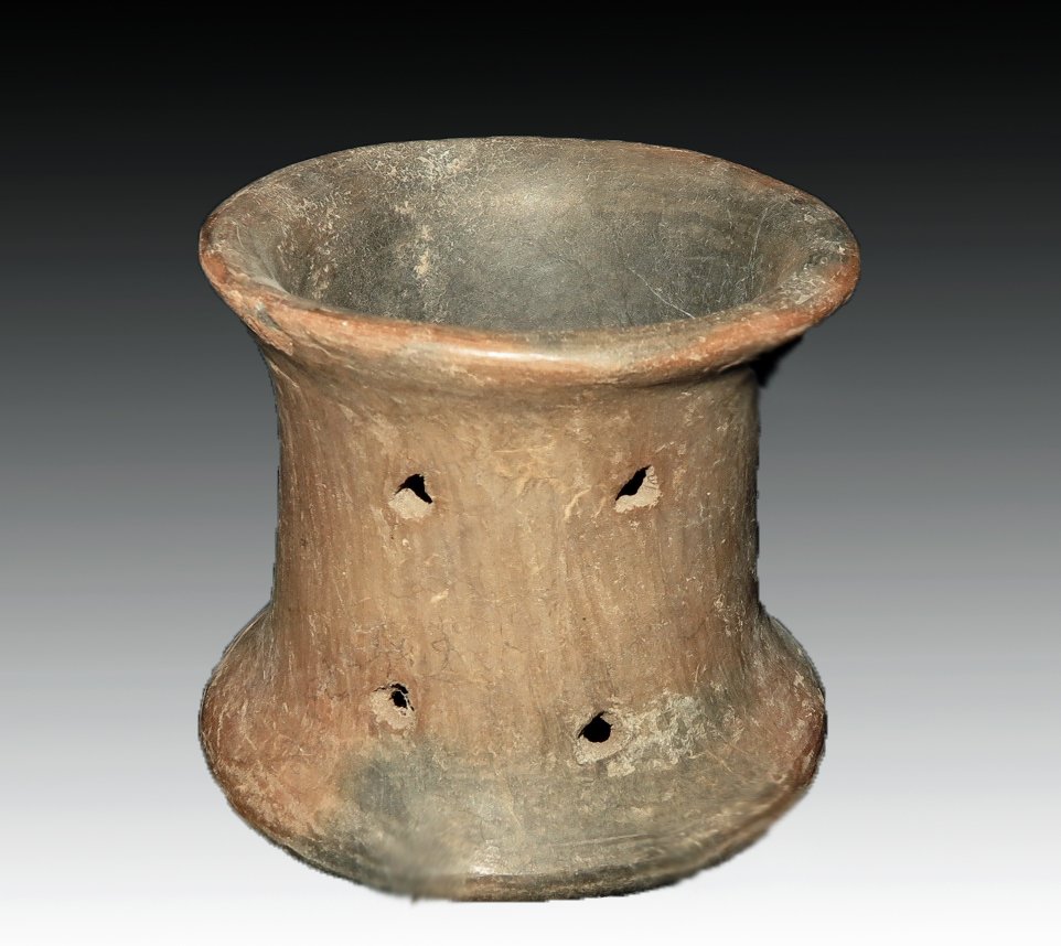 Another Pre-Columbian Perforated Spool: Colima, W. Mexico, Ca 300 BCE to 300 CE. Another huge spool that just makes my ears hurt if this was actually used as an ear spool! Lighter clay but again with the multiple perforations. 3 1/4" tall P