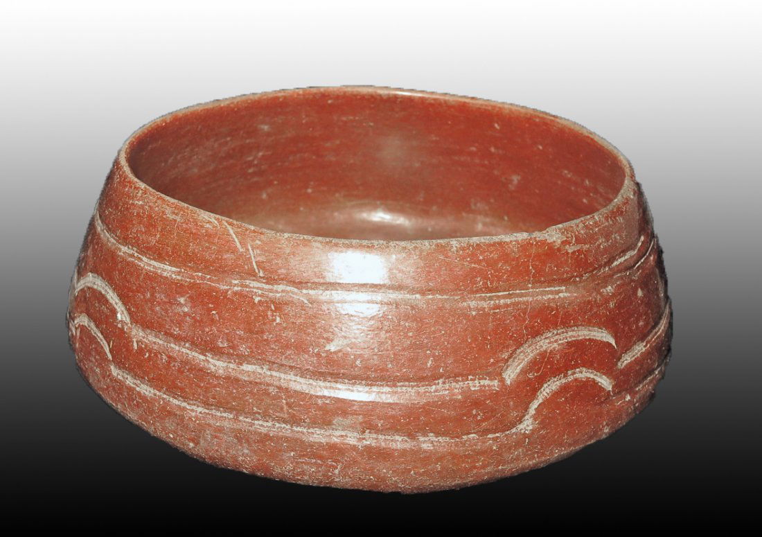 Pre-Columbian Nayarit Incised Redware Bowl: Nayarit, W. Mexico, Ca 300 BCE to 300 CE. Lovely and near choice redware bowl. Decorated with set of three incised lines. 6 3/4" wide, Provenance: Ex-Lynn Langdon collection acquired in the 1950's. Al