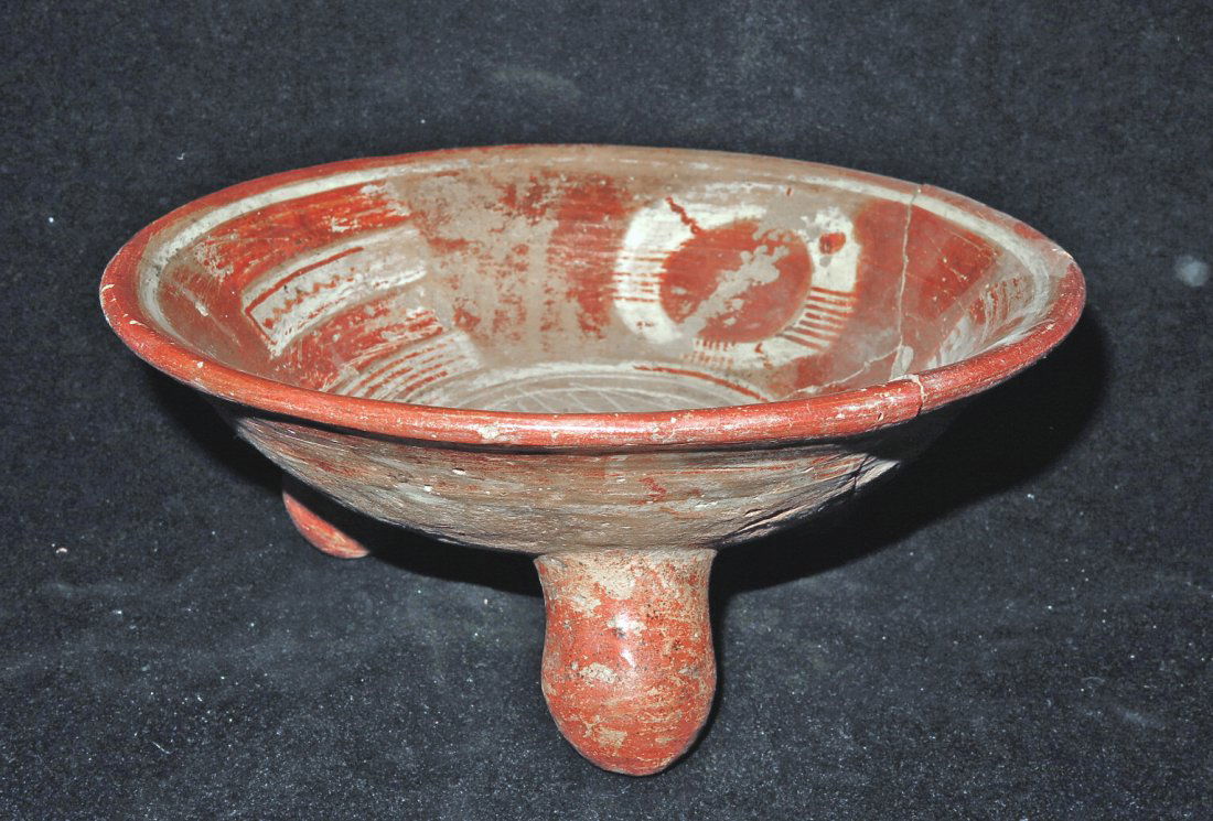 Tarascan Pre-Columbian Tripod Grater Bowl: Tarascan, Mexico, Ca 1000 to 1500 CE. Large tripod vessel on bulbous rounded legs, grater incorporated into base, painted with very bold geometric patterns. 9 1/2" wide. Provenance: Ex-Lynn Langdon co