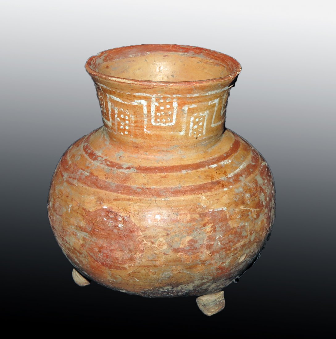 Pre-Columbian Jalisco Polychrome Tripod Jar: Jalisco, W. Mexico, Ca 300 BCE to 300 CE. Another cute jar! Bulbous base with three short legs, slightly flared neck and rolled rim, decorated with added red and white paint in geometric and circular 