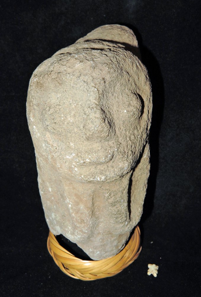 Pre-Columbian Stone Votive Figure + Miniature Pendant: Colima, west Mexico, Ca 300 BCE to 300 CE. Large stone votive in human form, hands resting under his chin. 8-1/4 tall and quite rare! Next, miniature stone pendant in human form. Simple features, dril