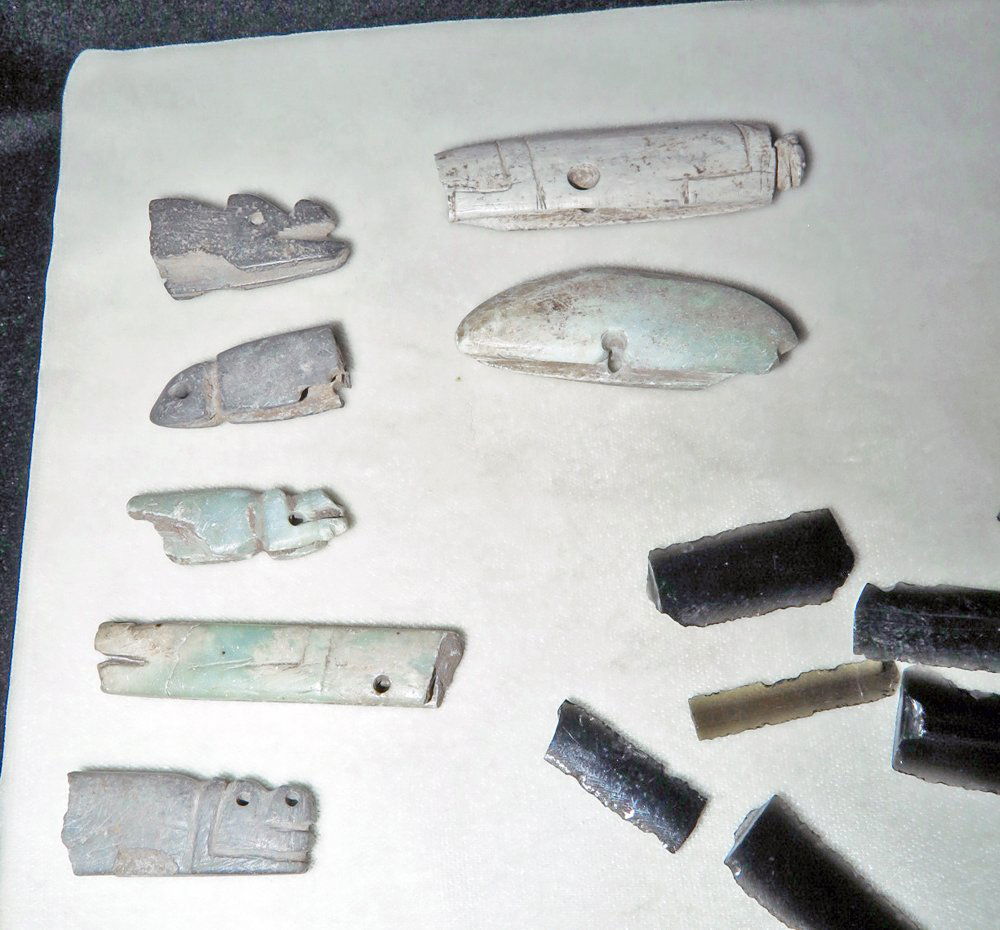 7 Pre-Columbian Blade Holders + 7 Obsidian Blades: West Mexico, Ca 300 BCE/CE. The ancient cultures made wonderful stone knife holders in the form of pendants - such as these - to be able to safely handle incredibly sharp obsidian flake blades. 7 larg