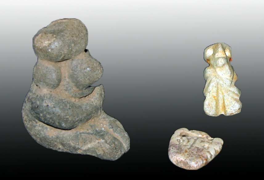Lot of 3 Pre-Columbian Stone Figural Pendants: Nayarit and Colima, Mexico, Ca 300 BCE/CE. Interesting lot of pendants starting with seated human figure in gray clay, hands to belly and drilled for suspension. 1-5/8" tall. Next, stone pendant of hu