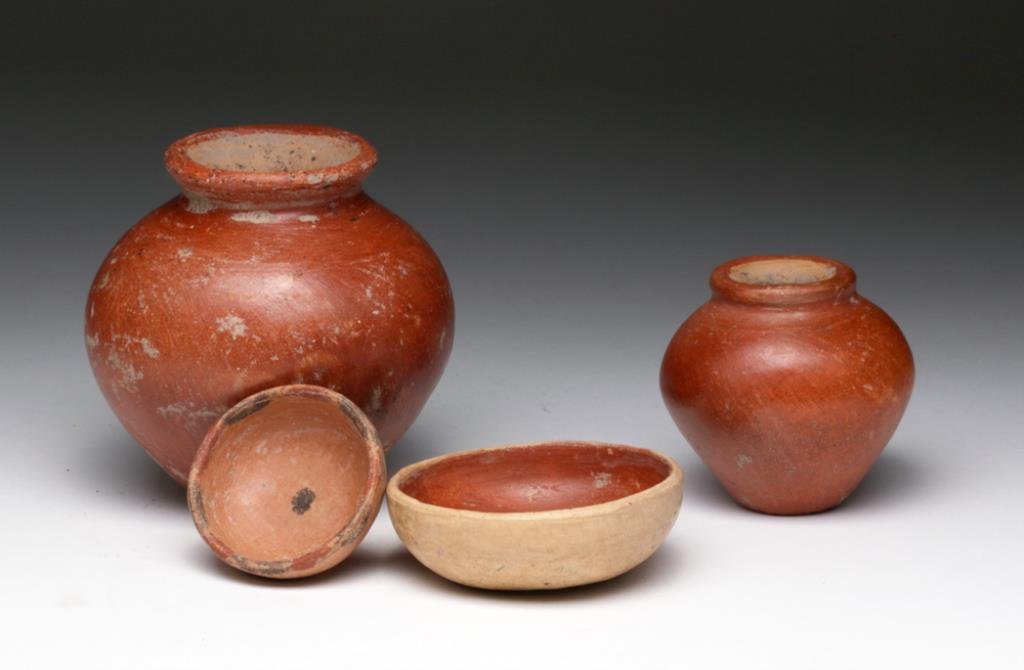 Lot of 4 Jalisco Pottery Vessels: Pre-Columbian, West Coast, Mexico, Ca 300 BCE to 300 CE. A lovely and choice group of pottery items! Two redware jars, each of similar form with short rim and piriform shape, lip of each reserved - 3-