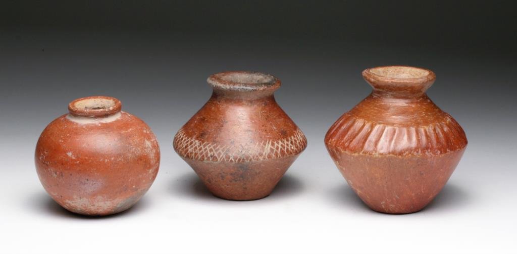 Another Lot of 3 Colima Redware Jars: Pre-Columbian, West Coast, Mexico, Ca 300 BCE to 300 CE. Another group of fine Colima pottery items! Three smallish pottery seed jars, two in piriform shape, other very rounded. The two piriform shape