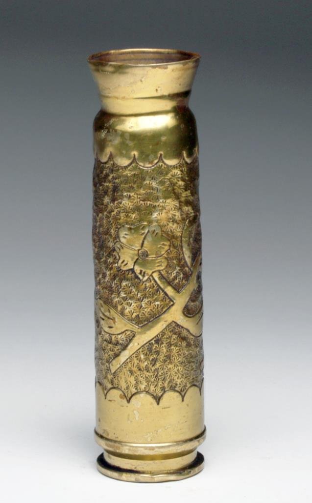WWII Brass 30mm Aircraft Cannon Shell Trench Art: Ca 1942 to 1945, unsure whether Pacific or European Theater. Decorated 30mm shell, decorated for most of its length in an intricate floral design. If you can imagine sitting in a trench (or on a ship)