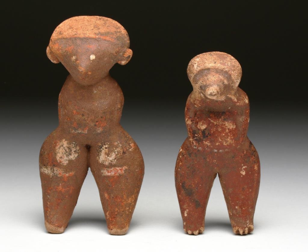 Pair of Pre-Columbian Chinesco Figures: Nayarit, Mexico, Ca 300 BCE to 300 CE. Pair of pottery standing figures in the style known as Chinesco. Each figure with typical triangular head, arms to the sides, painted in red pigment, one with ad