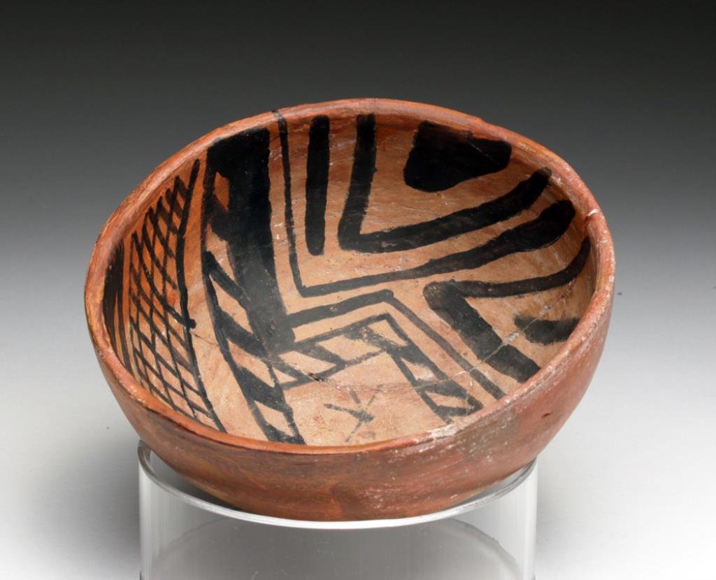 Native American Anasazi Gila Bowl: Anasazi, approximately 60 miles east of Phoenix in the Superstition Mountains. Salado Polychrome transitional Gila, Ca 1300 to 1400 CE. Black over red base in geometric pattern, exterior reserved red.