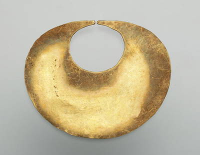 Pre-Columbian Gold Nose Ornament, 5.4g: Pre-Columbian, Peru, Salina culture, ca. 400 BCE - 200 BCE. High karat (18K) gold nose ornament composed of hammered sheet gold weighing 5.4 gms. 55mm x 46mm. Provenance: HD Enterprises, Aurora,