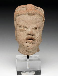 Realistic Pre-Columbian Olmec Baby Head: Mexico, Olmec culture, ca. 12th - 9th BCE. Head of pudgy ceramic Olmec baby belonging to an ancient Mesoamerican tradition that flourished during the first millenium BCE. Boasts characteristically