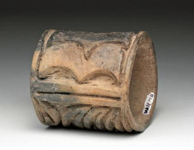 Pre-Columbian Olmec Ceramic Roller Stamp: Pre-Columbian, Southern Mexico to Guatemala, Olmec, ca. 650 BCE. Large ceramic cylindrical roller stamp or seal with finely carved feature and wave patterns created and used by the Olmecs. When