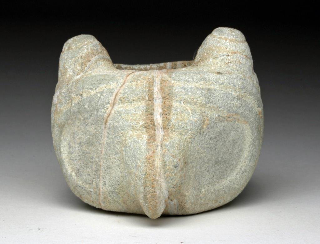Pre-Columbian Mace Head - Avian Form: Pre-Columbian, Costa Rica, ca. 500 to 800 CE. Lovely ceremonial mace head carved from pure white stone in the form of a owl's head with string-cut features. This is how authentic mace heads look befor