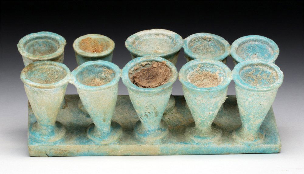 Egyptian Faience Kohl Container - 10 Vials: Egypt, Third Intermediate Late Period, Ca. 1085-341 BCE. Egyptian faience cosmetic palette complete with two rows of five cup-shaped elements in which different unguents could be stored. Kohl is still