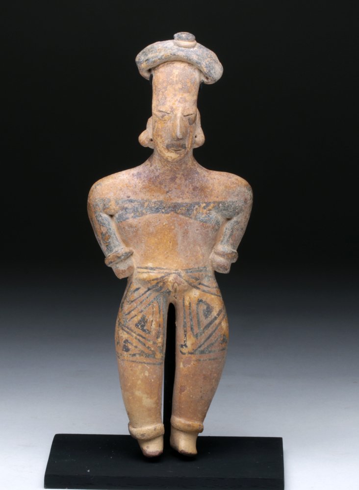 Colima Flat Female w/ Geometric Decoration: Pre-Columbian, West Mexico, Colima, ca. 300 BCE - 300 CE. Refined terracotta female figure, standing with arms close to body and eyes closed as if engaged in a trance-like state. Body is elegantly ado