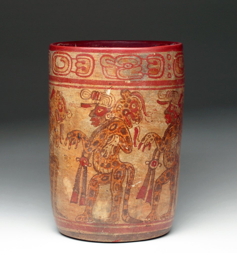 Mayan Copan Painted Ritual Cylinder: Pre-Columbian, Copenac Class, Late Classic Period, ca. 600 to 900 CE. Bold, large vessel with painted orange, tan, brown and red body with a processional of lords or deities, wearing jaguar skins. Hie