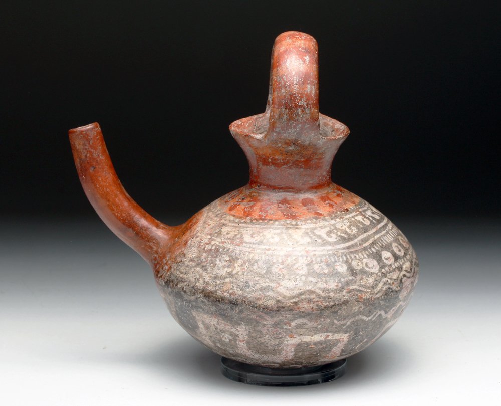 Michoacan Polychrome Spouted Vessel: Pre-Columbian, West Mexico, Tzintzuntzan, Michoacan, ca. 300 BCE to 300 CE. Some of the finest indigenous pottery of Mesoamerica comes from the Michoacan artisans. This vessel was expertly hand built.