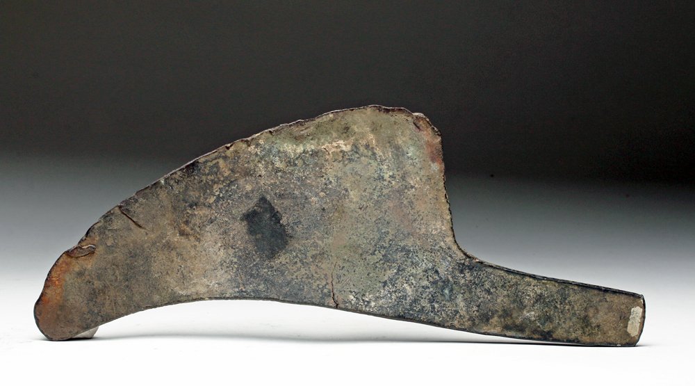 Large Aztec Copper Hacha: Pre-Columbian, Mexico, Aztec, Mexico City region, ca. 1350 to 1500 CE. A very rare and large cpper axe with long flange and sweeping blade. Designed to be inserted into a long wooden haft. Nice exampl