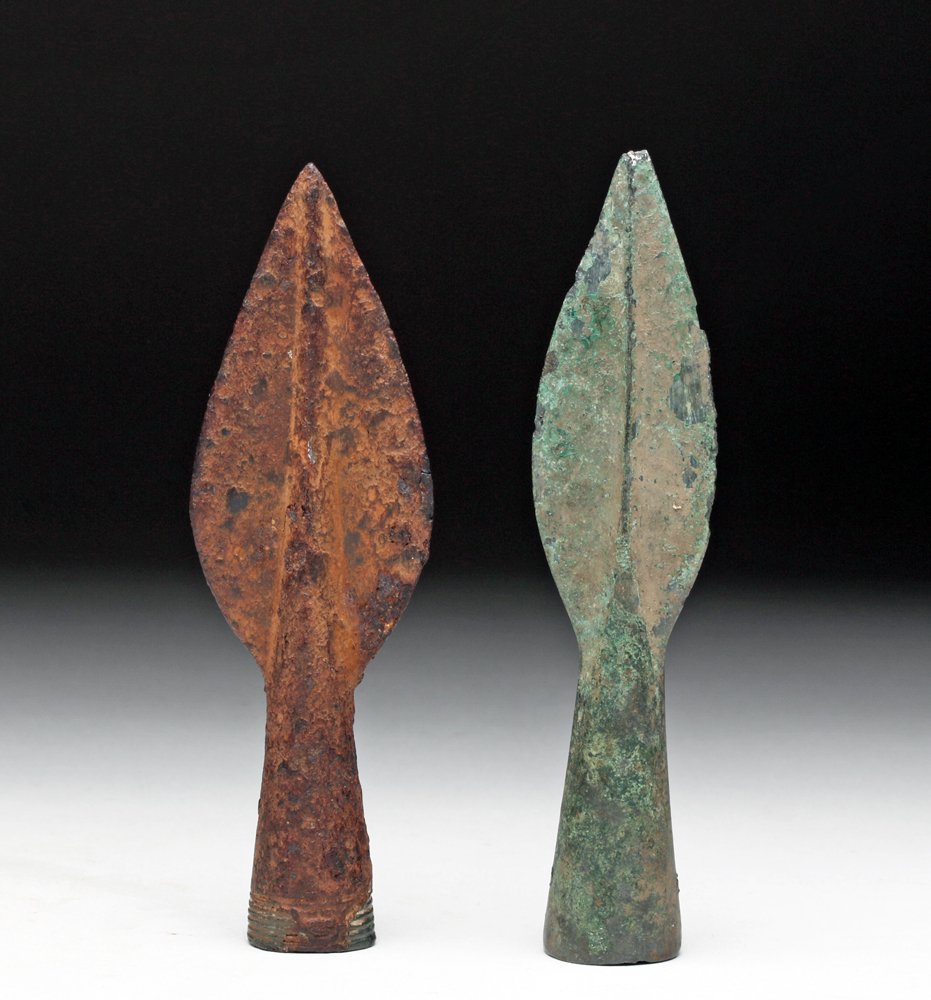 Pr. Ancient Roman Bronze Socket Spear Heads: Roman Empire, ca. 1st to 3rd century CE. Nice lot of 2 small socketed spear tips. First is bronze with high central ridge and tapered socket. Next is iron but with bronze decorated socket end. Size: 4