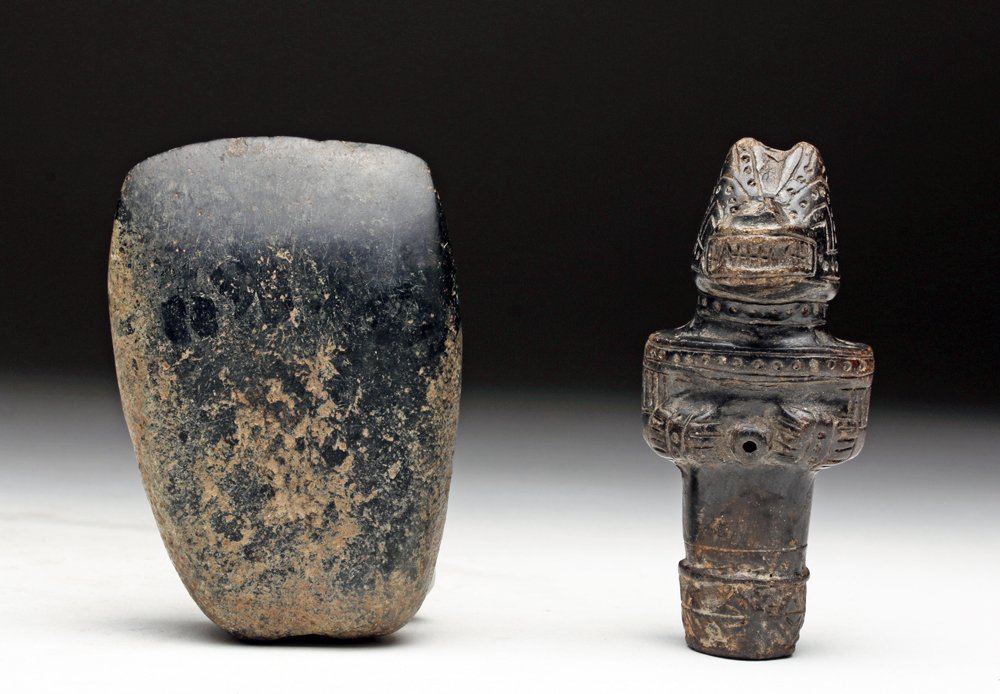 Tairona Pottery Whistle & Stone Celt: Pre-Columbian, Colombia, Tairona culture, ca. 1000 CE. Fine pottery blackware whistle in the form of a standing jaguar transformational beast. Spout to whistle is at top of the head, hole at base allo