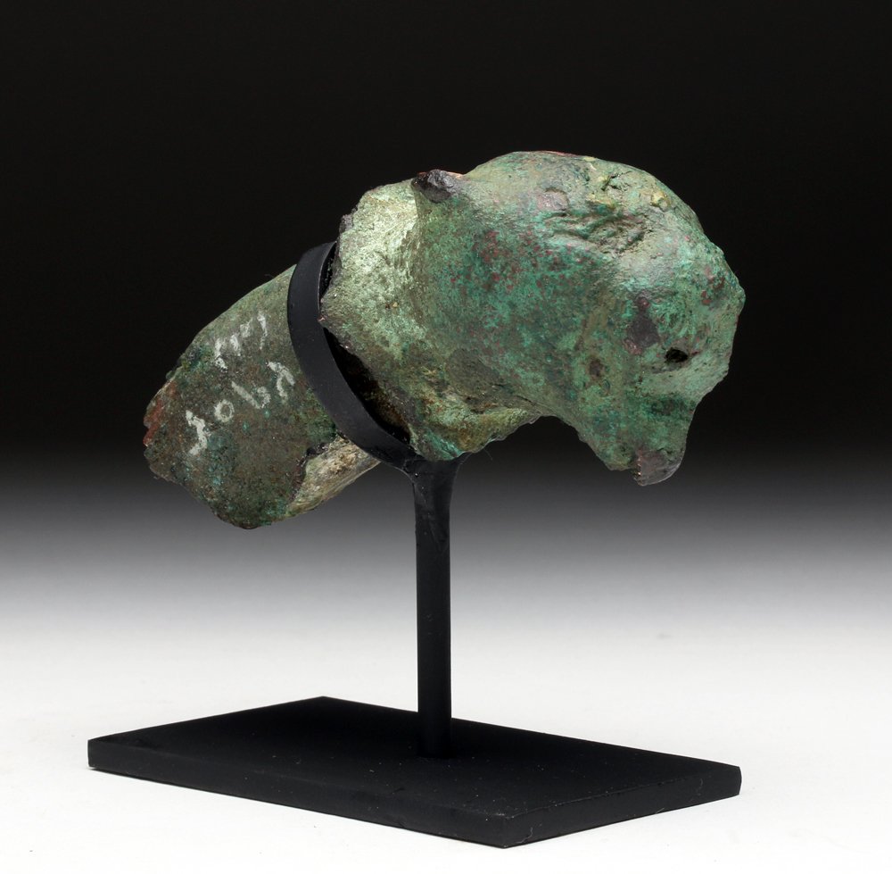 Roman Bronze / Lead Attachment - Panther: Roman Empire, ca. 1st to 3rd century. Unusual bronze and lead attachment. Jaguar or panther head emerges from the collar, ears back a bit, mouth open and tongue extended. Custom stand. Size: 4" L. Pro