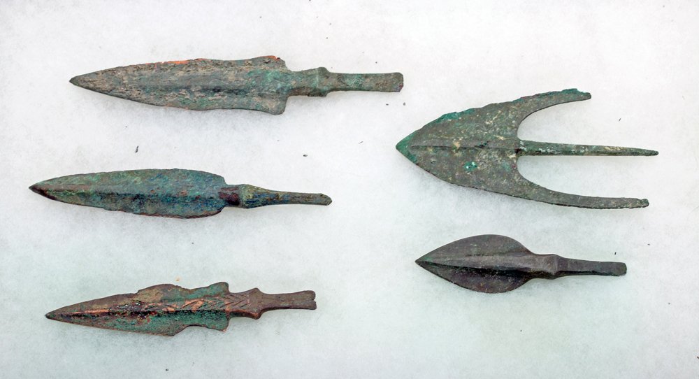Lot of 5 Persian Bronze Arrow Points: Northern Iran, Luristan, ca. 1200 to 800 BCE. Very fine lot of bronze arrow and spear points. Each with solid insertion tang and nice assortment of styles. Size: 5" for longest. Provenance: Ex-private