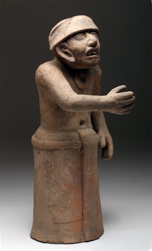 Large and Expressive Vera Cruz Pottery Figure: Pre-Columbian, Mexico, Vera Cruz/Veracruz, ca. 400 to 600 CE. An exceptionally tall and expressive hand-built terracotta figure created by the Mesoamericans of Vera Cruz, Mexico; bare chested with nav