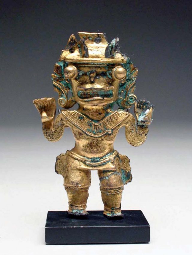 Pre-Columbian Gilded Transitional Figure: Pre-Columbian, Colombia, Quimbaya, ca. 1000 CE. The Quimbaya civilization is renowned for its goldwork, demonstrating both fine technical accuracy and remarkably detailed designs. These artisans relis