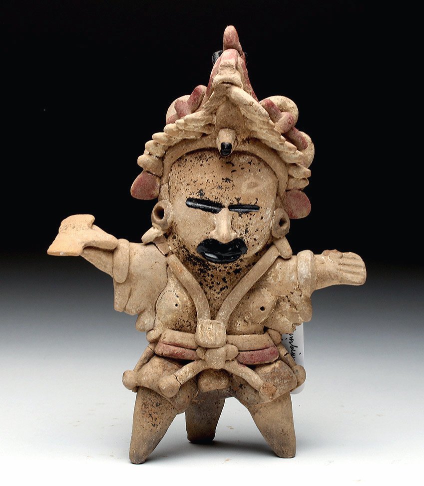 Exceptional / Tall Veracruz Standing Shaman: Pre-Columbian, Southeastern, Mexico, Vera Cruz, ca. 400 to 600 CE. A truly wonderful terracotta standing figure, legs akimbo, arms outstretched holding a short axe in his right hand. What truly sets t