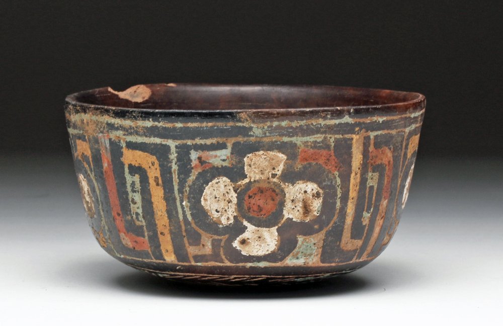 Colorful Tarascan Stuccoed Pottery Bowl: Pre-Columbian, Mexico, Michoacan, Tarascan, ca. 1200 to 1500 CE. Lovely bowl! Deep brownware bowl decorated with added stucco in vibrant shades of red, gold, green and white in 4 floral registers with