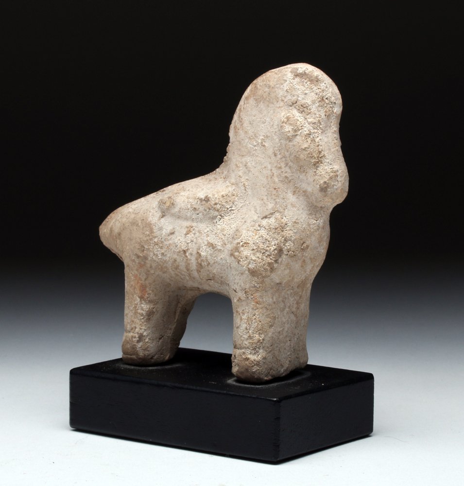 Greek Terracotta Pegasus Horse Statuette: Greece, ca. 5th century BCE. Rare pottery Pegasus with wings folded upon his back. Mane incised and a very nice presentation! Custom base. Size: 3-1/2"L x 3-3/4"H. Provenance: Ex-private P. Haig coll