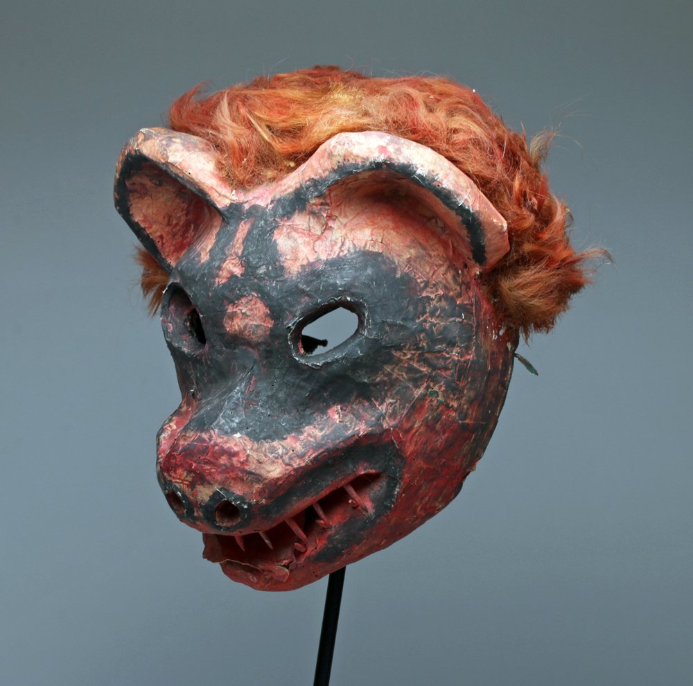 Rare 20th C. Mexican Papier Mache Pig Mask: West Mexico, Nayarit, Jesus Maria, ca. mid 20th century CE. A Mexican papier mache mask depicting a fearsome hog created by the Cora Indians of Jesus Maria in Nayarit, Mexico. The mask is hand painted