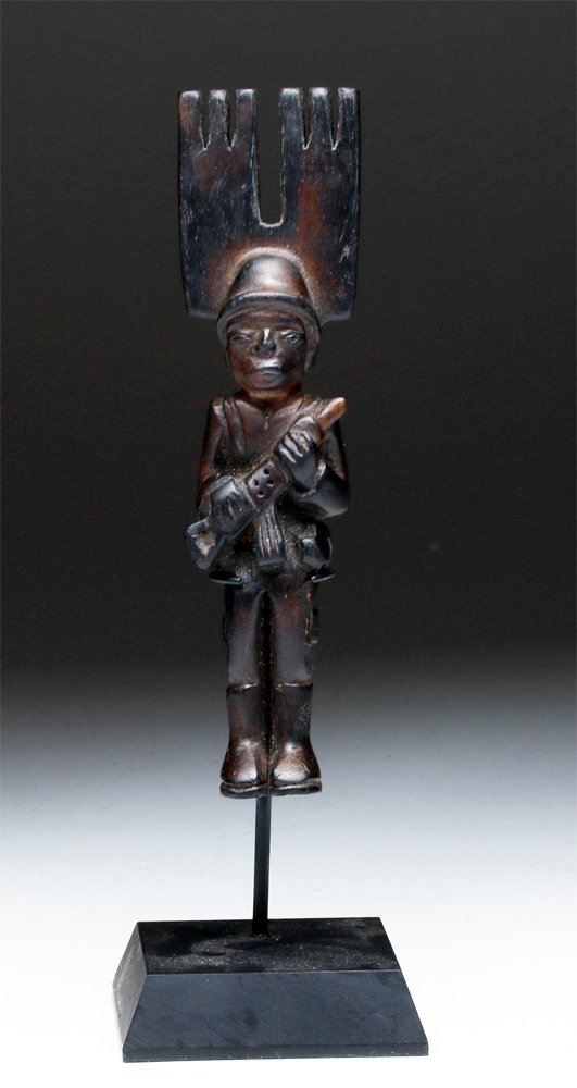 20th C. Guatemalan Wood Orqueta Onda, ex-Historia: Guatemala, ca. 3rd quarter of the 20th century CE. Wooden slingshot in a style that has been gaining extreme popularity with Folk Art collectors. Wooden handle in the form of a soldier. He wears an ar