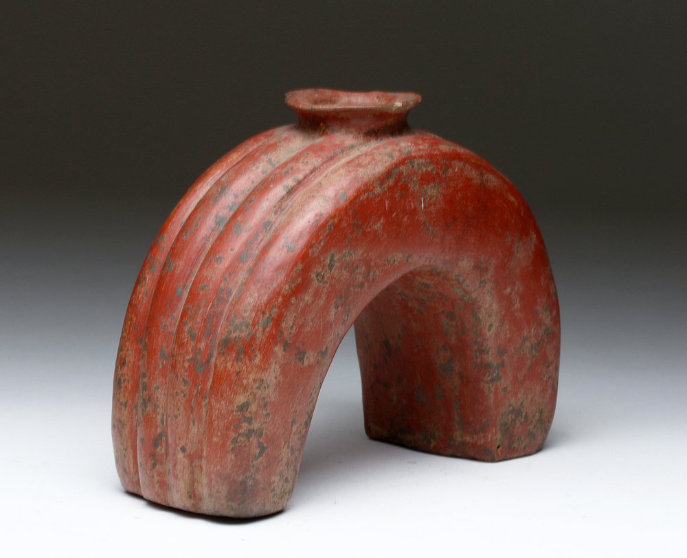 Colima Redware Pottery Vessel: Pre-Columbian, West Mexico, Colima, ca. 200 BCE to 200 CE. "Somewhere over the rainbow, way up high . . ." Surely you know the reference - Dorothy and the Wizard of Oz. Colima sculptors created a vast