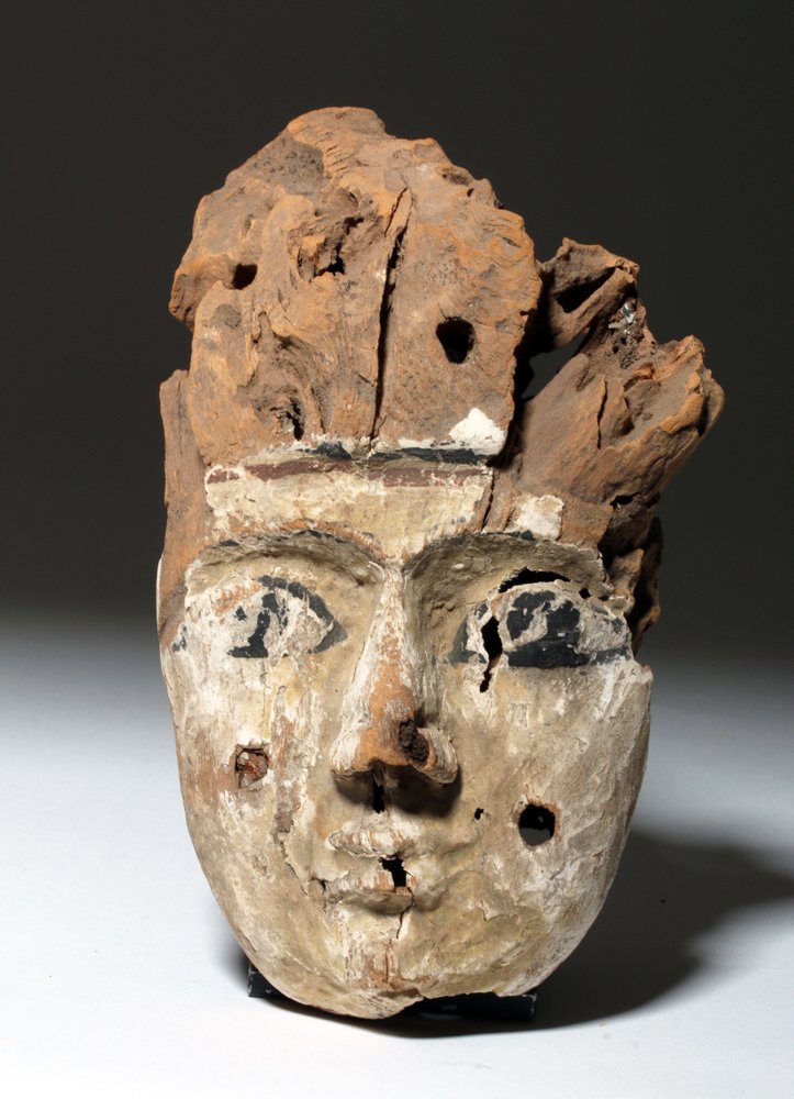 Late Dynastic Wooden Mummy Mask, ex-J. Malter: Ancient Egypt, Late Dynastic, Dynasties 25 through 30, ca. 700 to 330 BCE. Small wooden mummy mask with finely carved human face, probably a male, with naturalistic facial features and a subtle smile 