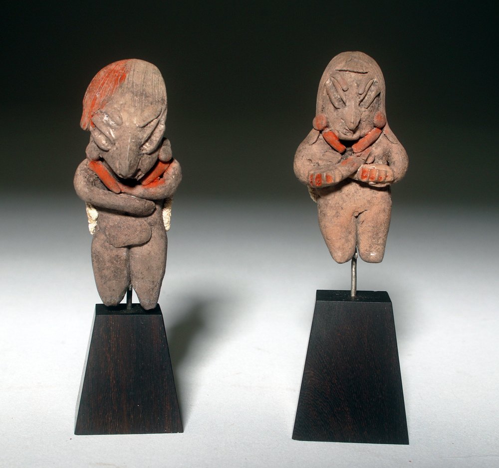 Pair of Chupicuaro Pottery Miniature Figures: Pre-Columbian, Mexico, Chupicuaro, ca. 800 to 200 BCE. This is a collection of two small figures in the classic Chupicuaro style, with highly stylized faces with long, flat noses, and long, slanting e