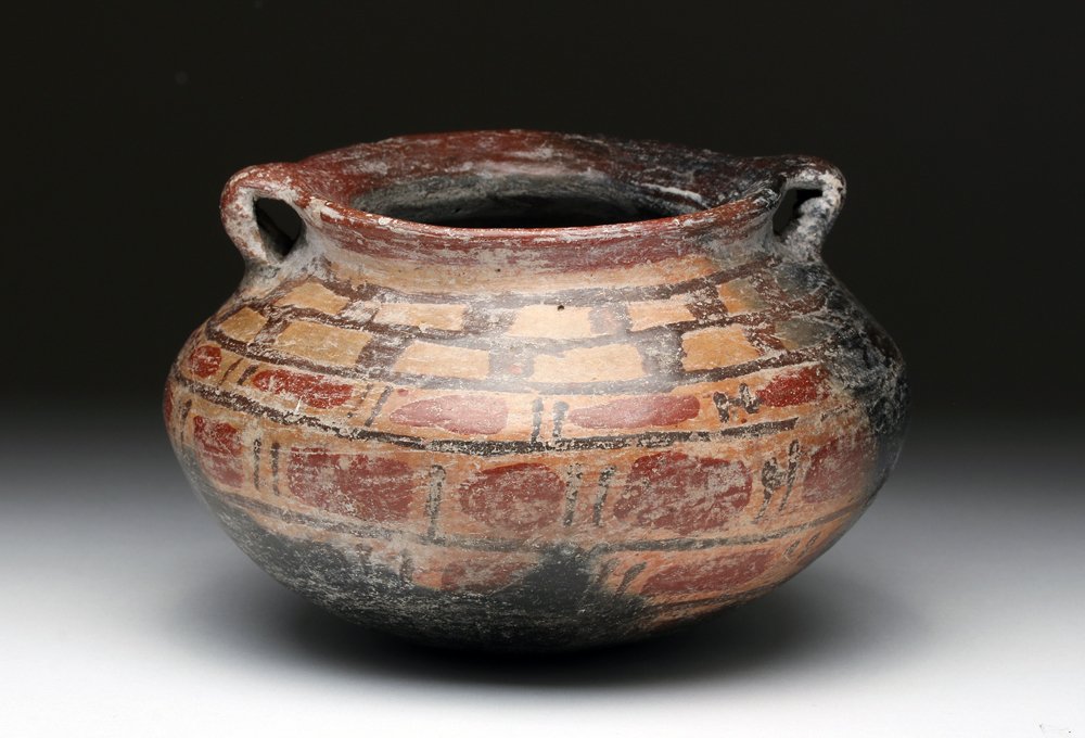 Chupicuaro Pottery Polychrome Olla: Pre-Columbian, Mexico, Guanajuato Valley, ca. 300 to 100 BCE. Attractive polychrome double-handled olla with pigments in red, black and brown in checkerboard pattern. Size: 5-1/2" D (14 cm). Provenanc
